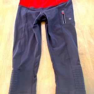 Short lululemon workout pants. Steel gray with red trim.24” long